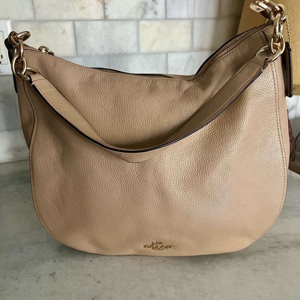 Coach pebble leather hobo handbag.